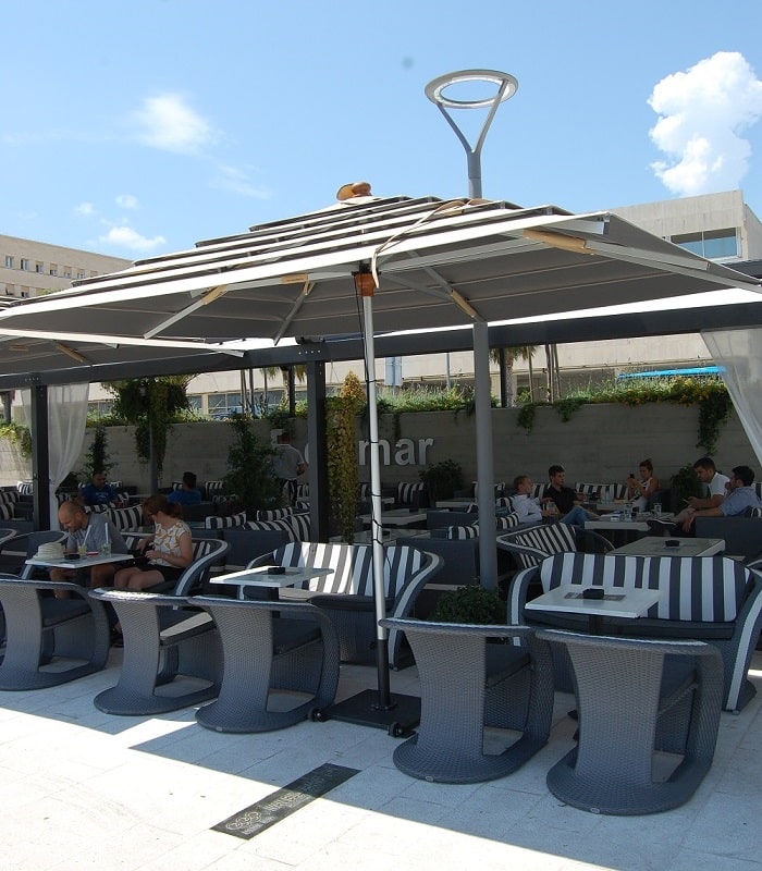 Parasol para terraza de hostelería resistente al viento, modelo Fiasole